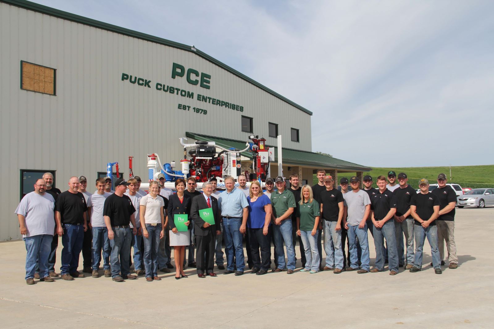 Puck Custom Enterprises Welcomes Visit From Governor Branstad