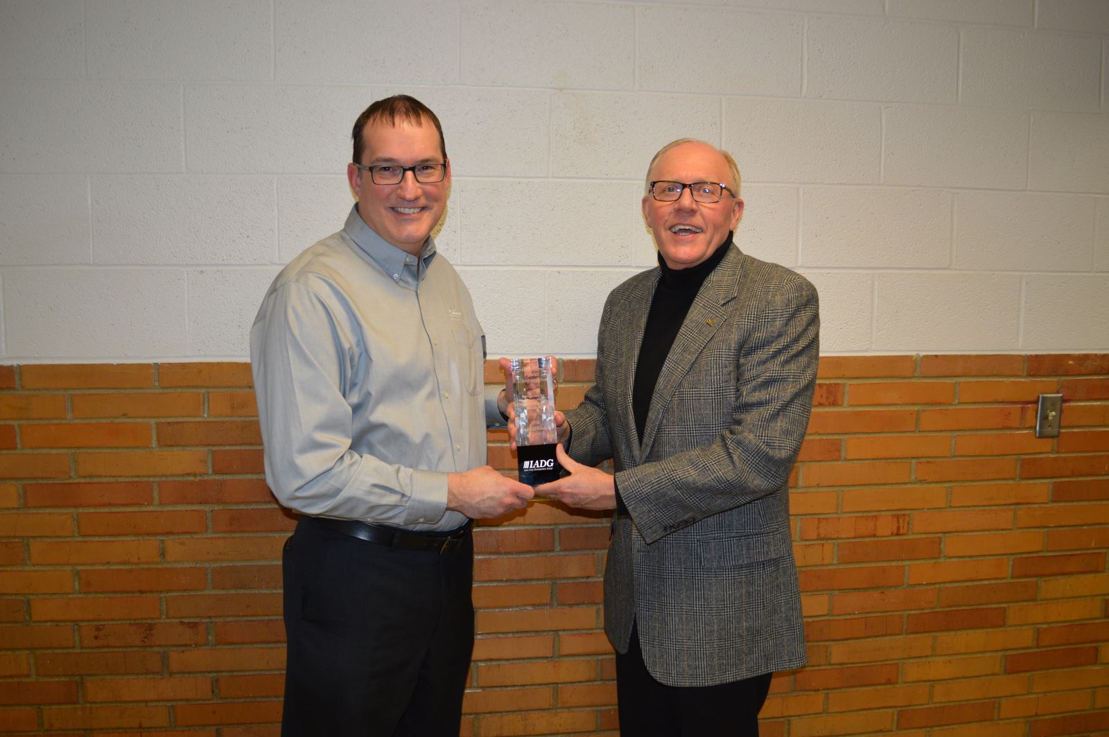 Heartland Power Cooperative is presented with an IADG Impact Award